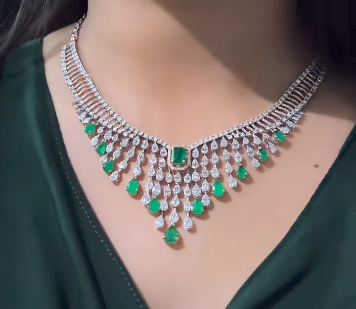Chawla Jewellers Anika emerald fringe necklace — multi-row diamond collar with emerald bar and pear diamond-emerald fringe
