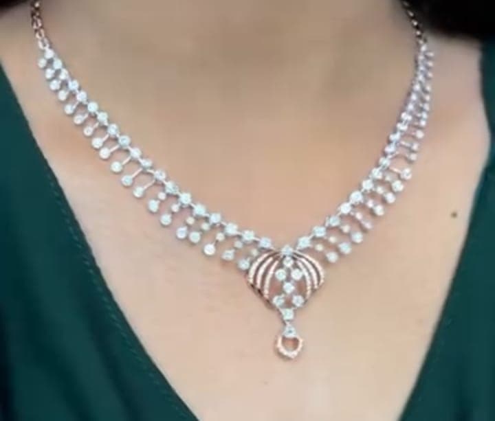 Chawla Jewellers Lina cage pendant necklace — diamond fringe line with rose-gold cage centrepiece and teardrop accent