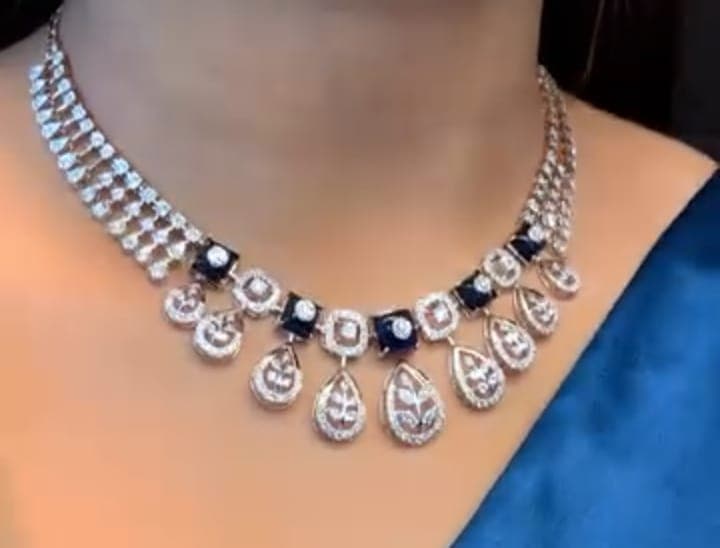 Chawla Jewellers Mira sapphire drop necklace — triple diamond strands with sapphire stations and pear diamond filigree drops
