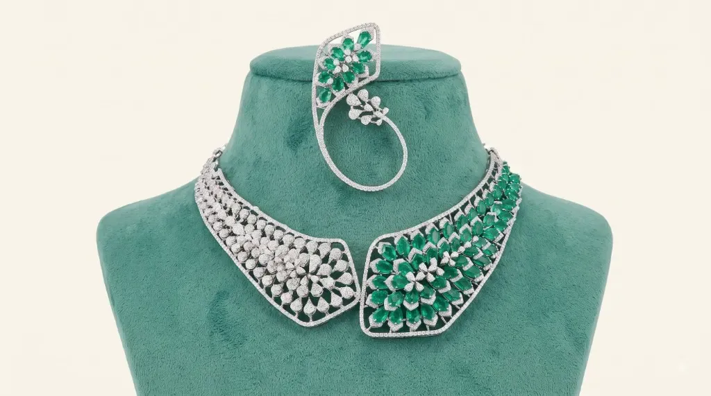 The Aanya Emerald Collar Necklace — Asymmetric diamond and emerald floral collar with ear cuff by Chawla Jewellers