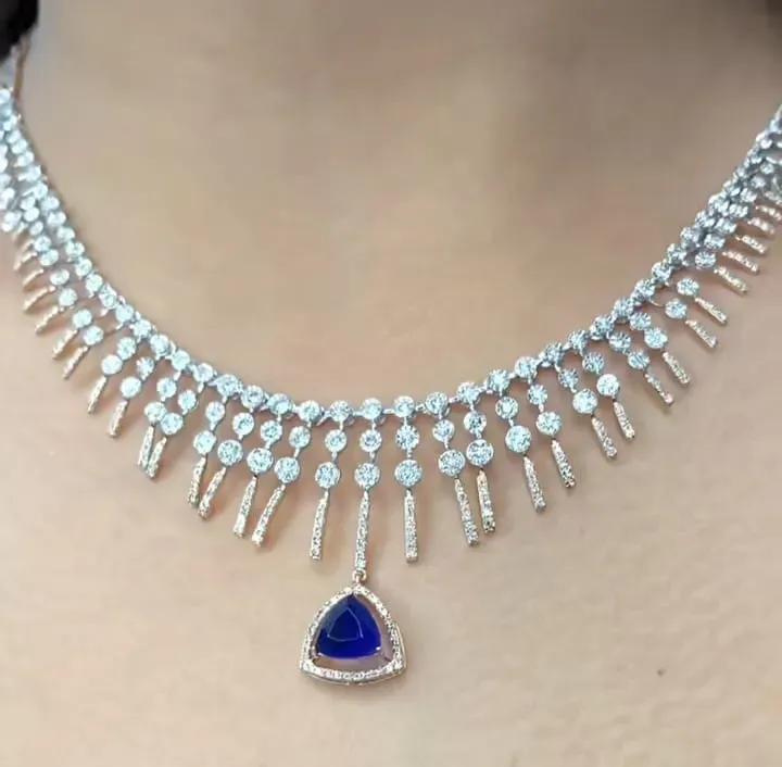 The Zara Fringe Sapphire Necklace — Graduated diamond fringe with trillion sapphire centre by Chawla Jewellers