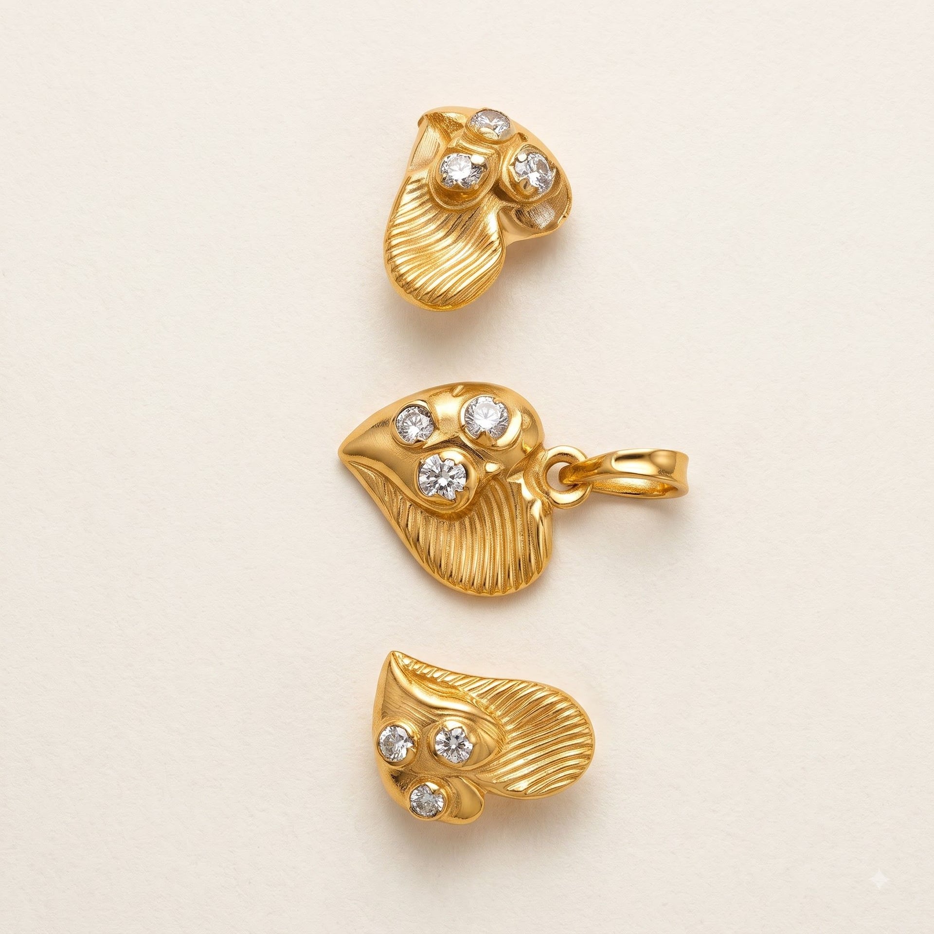 Tri-Heart Tops — Triple-heart cluster stud in textured 22kt gold by Chawla Jewellers