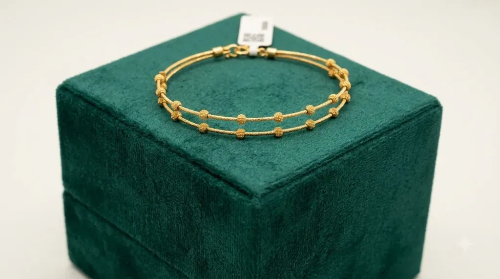 The Maaya Beaded Gold Bangle — Double-strand textured gold with granulated bead accents by Chawla Jewellers